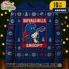 Miami Dolphins x Snoopy Ugly Christmas Sweater Peanuts Collaboration Teal Knitted Pullover NFL Holiday Jumper With Snowflakes Dolphins Logo Footballs And Orange Accents Winter Festive Apparel